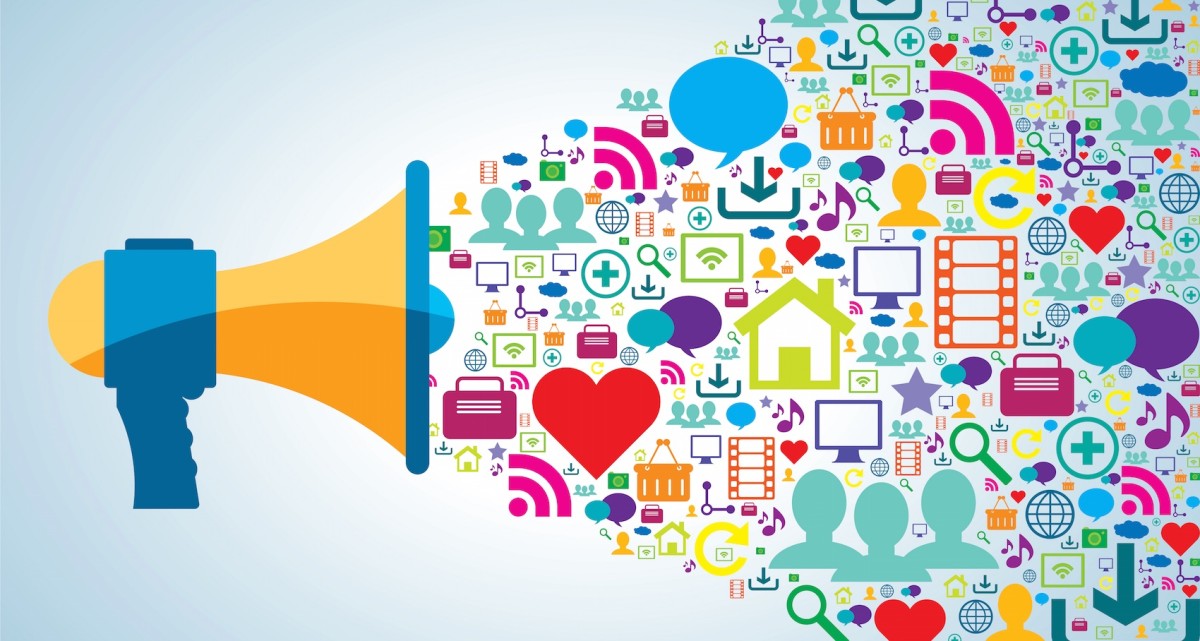 A megaphone emitting a colorful array of social media, communication, and technology icons representing digital outreach and