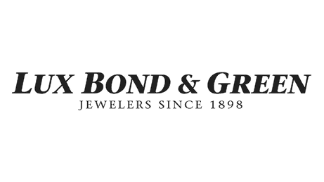 The image features the Lux Bond & Green logo with elegant black text and a tagline indicating they have been jewelers since